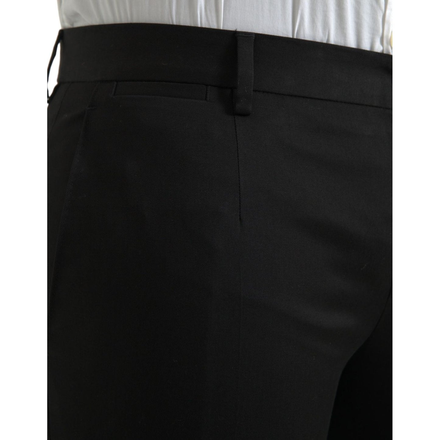 Dolce & Gabbana black cotton stretch slim fit dress pants with zipper closure, logo details, and high craftsmanship, made in Italy.