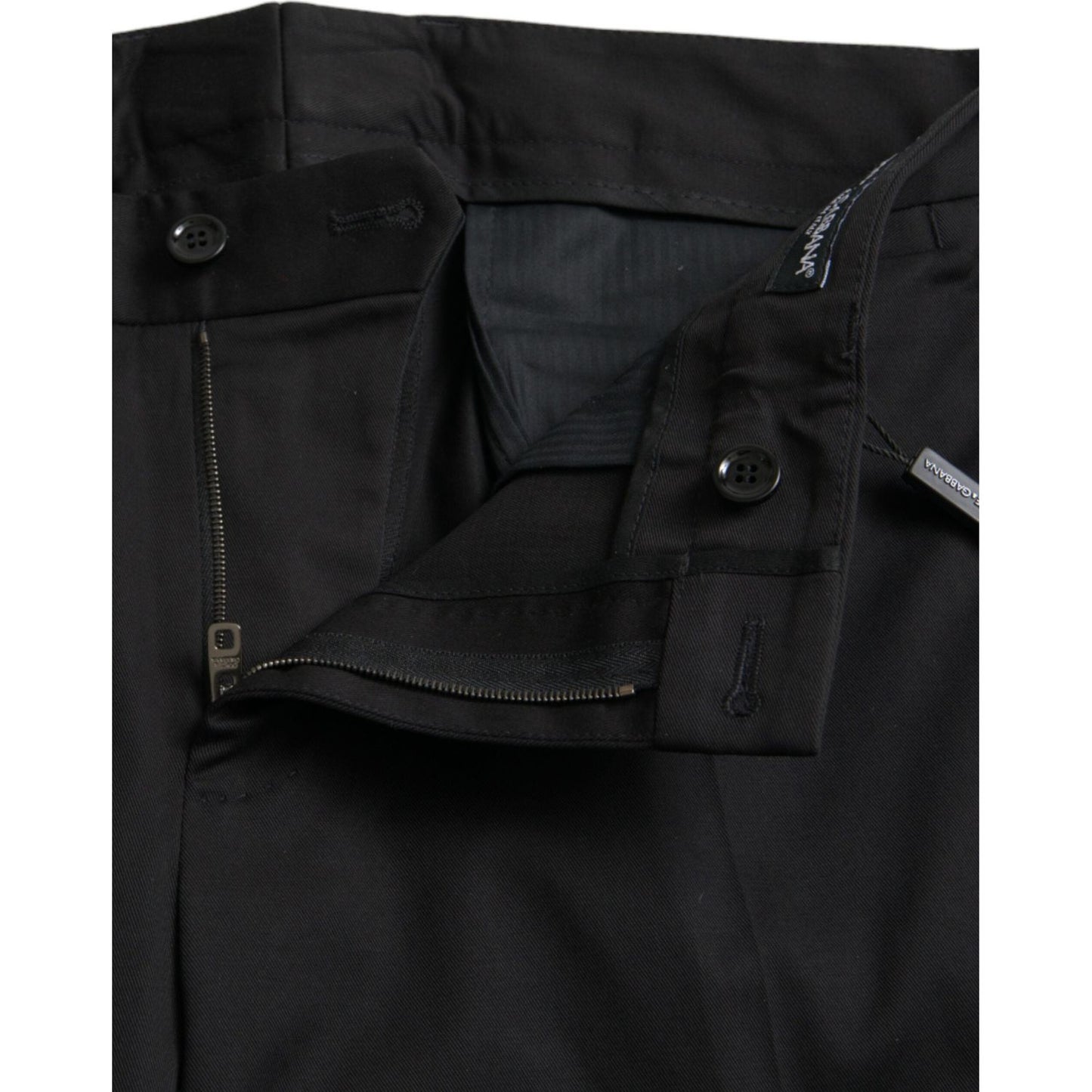Dolce & Gabbana black cotton stretch skinny dress pants with zipper closure, slim fit, 97% cotton, 3% elastane, logo details.