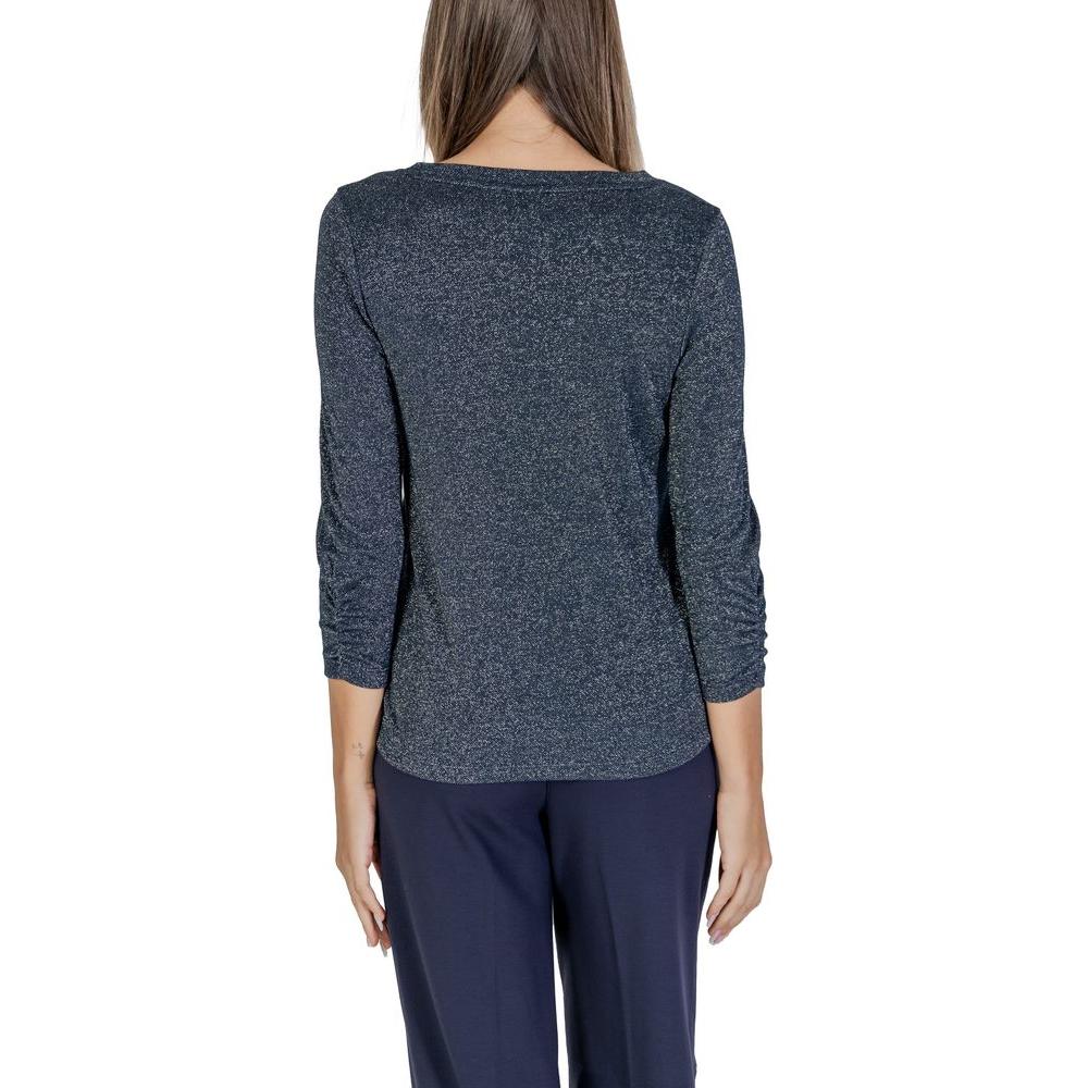 Back view of woman wearing Street One blue polyester top with 3/4 sleeves, part of the fall/winter women's collection.