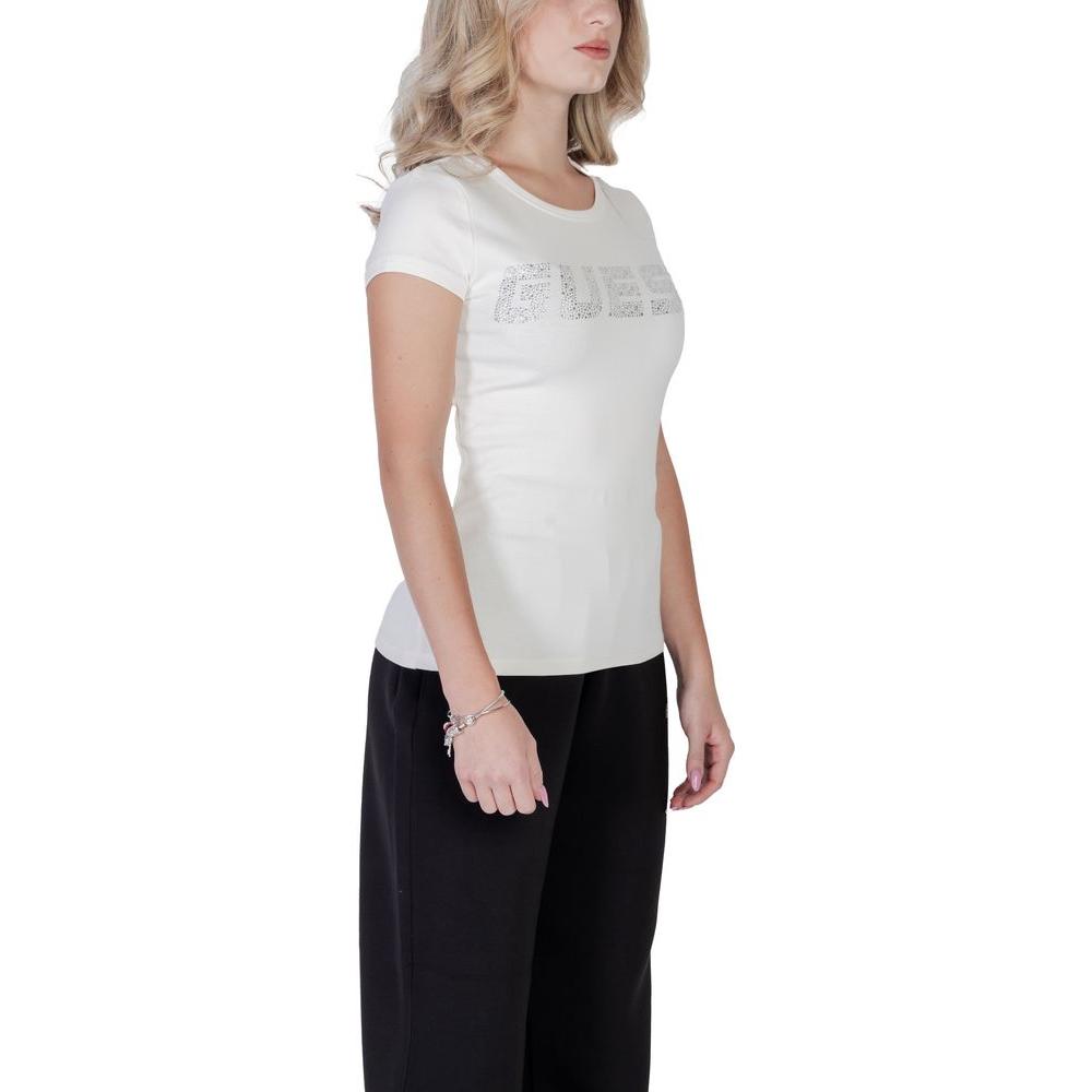 Woman wearing Guess Active short-sleeve cream cotton t-shirt with embossed logo, perfect for casual style and comfort.