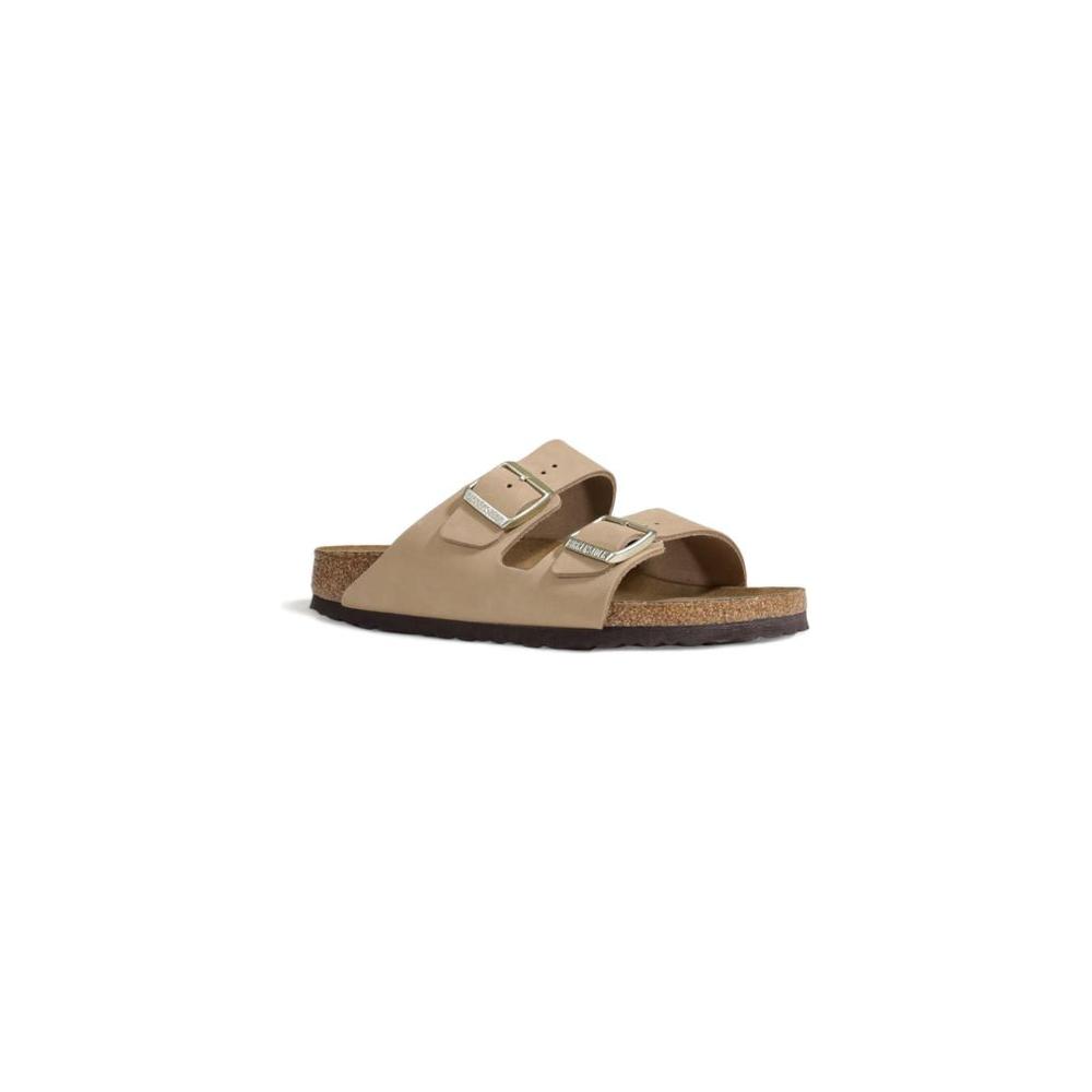 Birkenstock beige nubuck leather sandal for women, Fall/Winter collection, featuring two adjustable straps and cork sole.