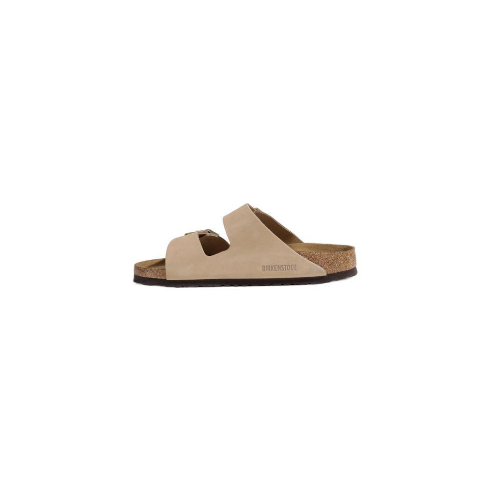 Birkenstock beige nubuck leather sandal for women, fall/winter collection, side view showcasing cork sole and strap design.