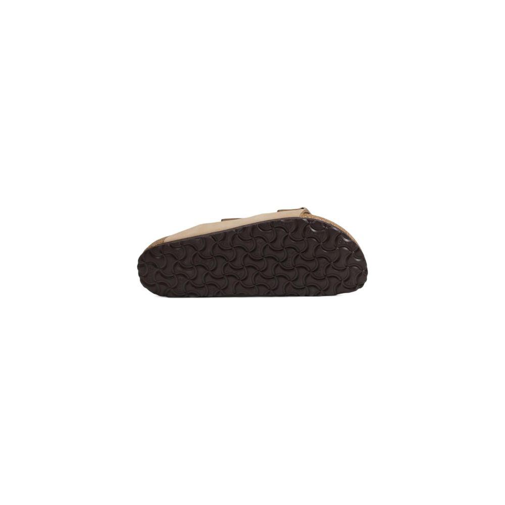Birkenstock beige nubuck leather sandal with dark sole, women's fall/winter collection, side view showing tread pattern.