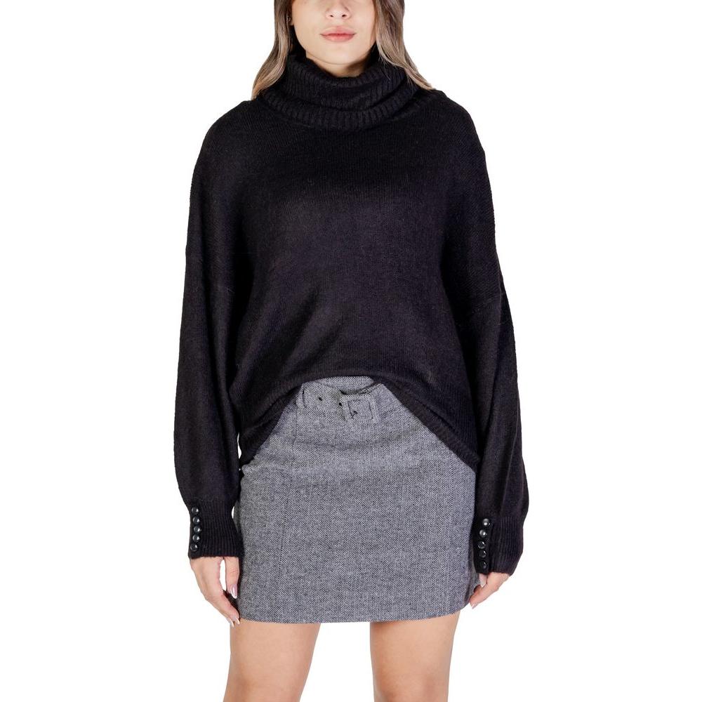 Woman wearing ICHI Black Acrylic Sweater, part of Fall/Winter women's knitwear collection, made with acrylic, polyester, alpaca, elastane.