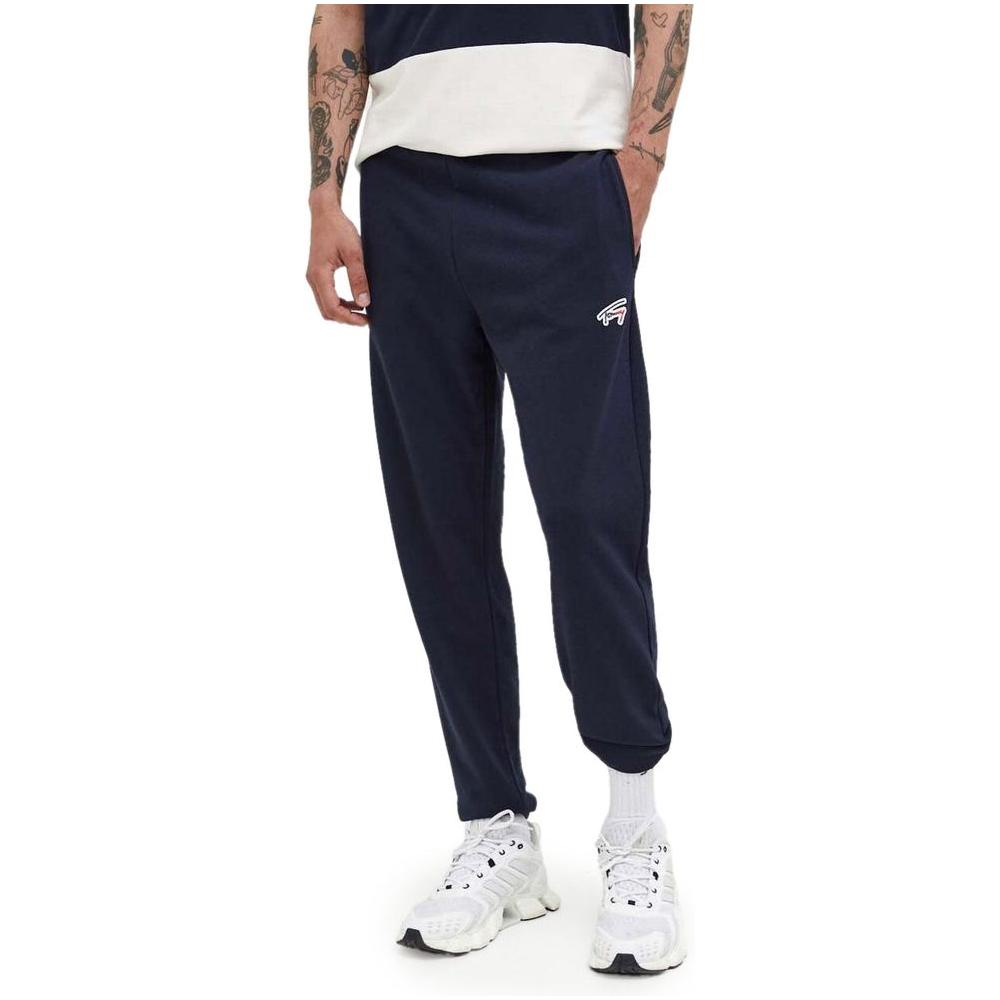 Men's blue sports pants made from recycled cotton and polyester by Tommy Hilfiger, ideal for Autumn/Winter fashion.