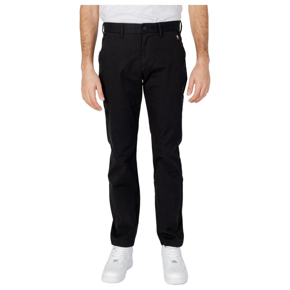 Men's black tapered jeans by Tommy Hilfiger, organic cotton blend, spring/summer collection.