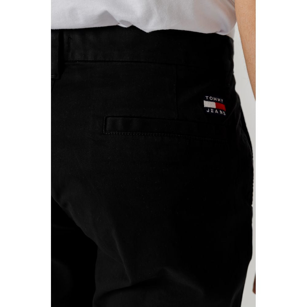 Tommy Hilfiger Jeans black organic cotton men's tapered pants from Spring/Summer collection, featuring logo detail on the back pocket.