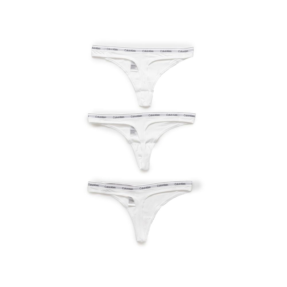 Three Calvin Klein white cotton underwear thongs in a row, showcasing the brand's minimalist design and elastic waistband.