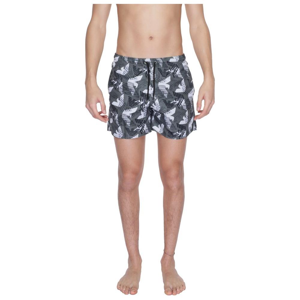 Emporio Armani men's black polyester swimwear with modern design and adjustable drawstring, ideal for beach or pool.
