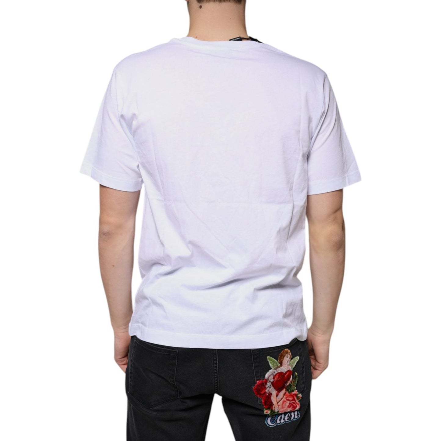 Back view of white Dolce & Gabbana logo cotton V-neck T-shirt worn by model, showcasing short sleeves.