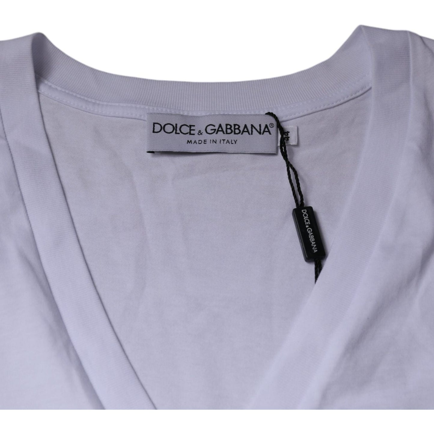 Dolce & Gabbana white V-neck cotton T-shirt with logo tag displayed.