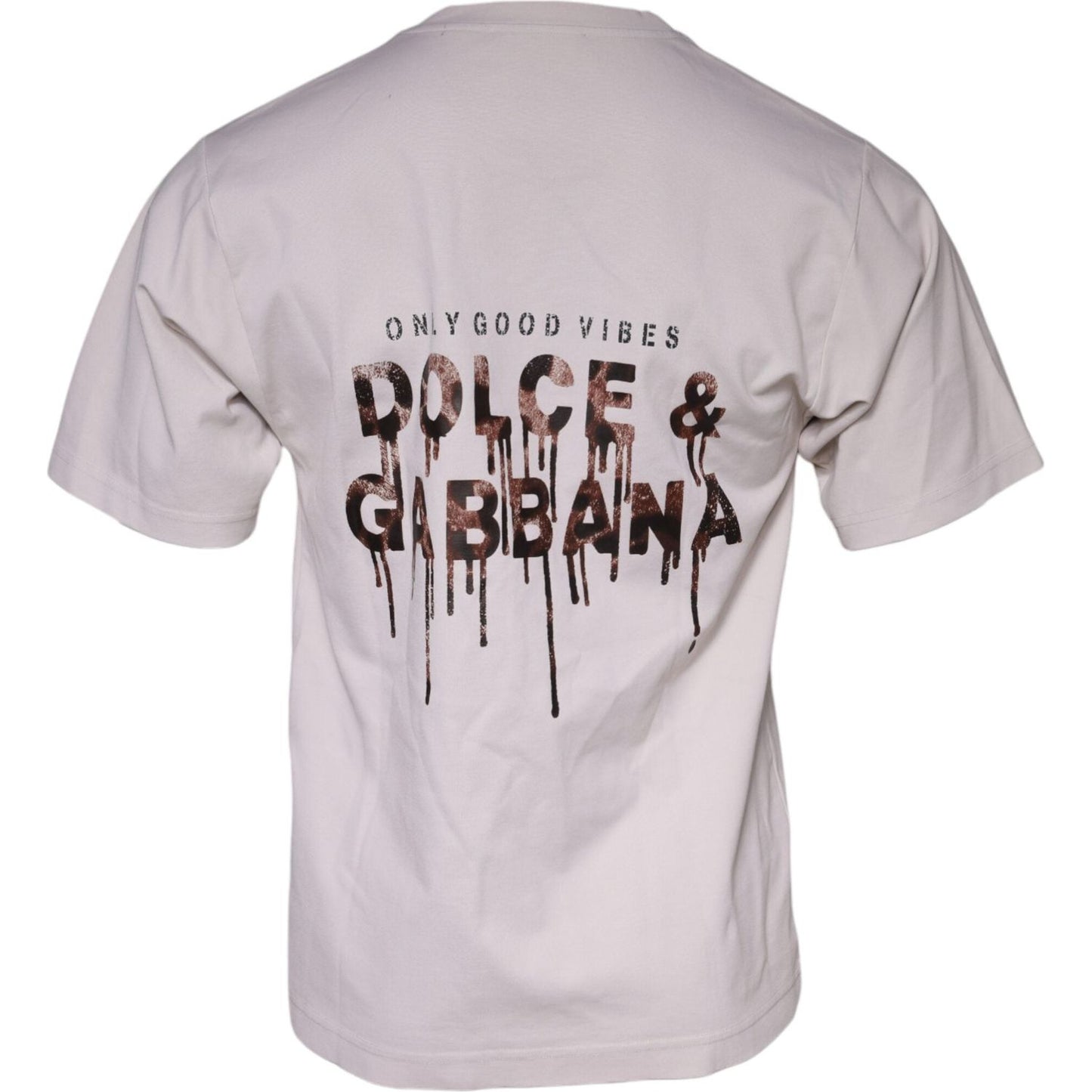 Back view of Dolce & Gabbana beige cotton blend crew neck t-shirt with graphic print and logo details, featuring minor stains.