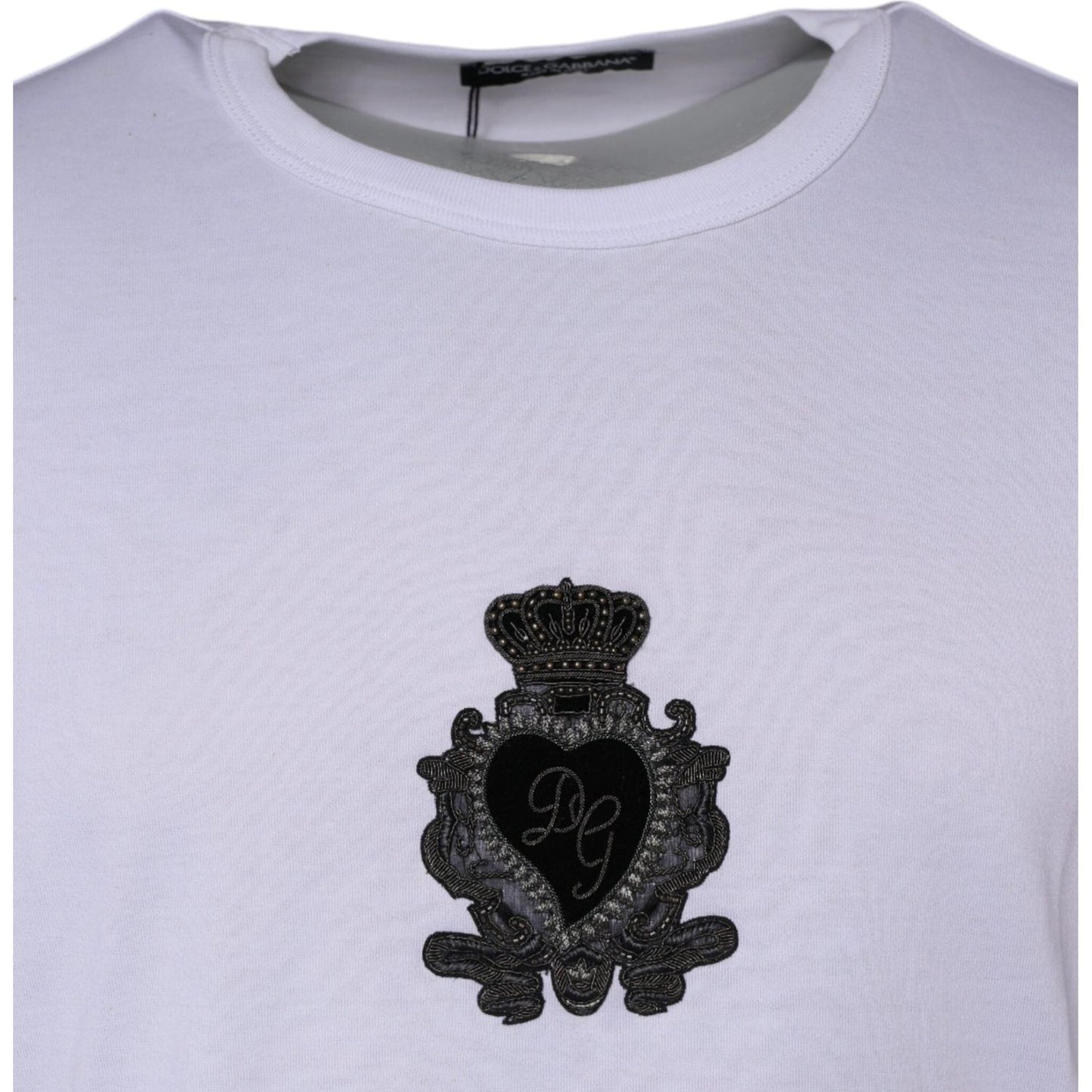Dolce & Gabbana white cotton T-shirt with black logo heart embroidery, crew neck, short sleeves, made in Italy, minor front stains visible.