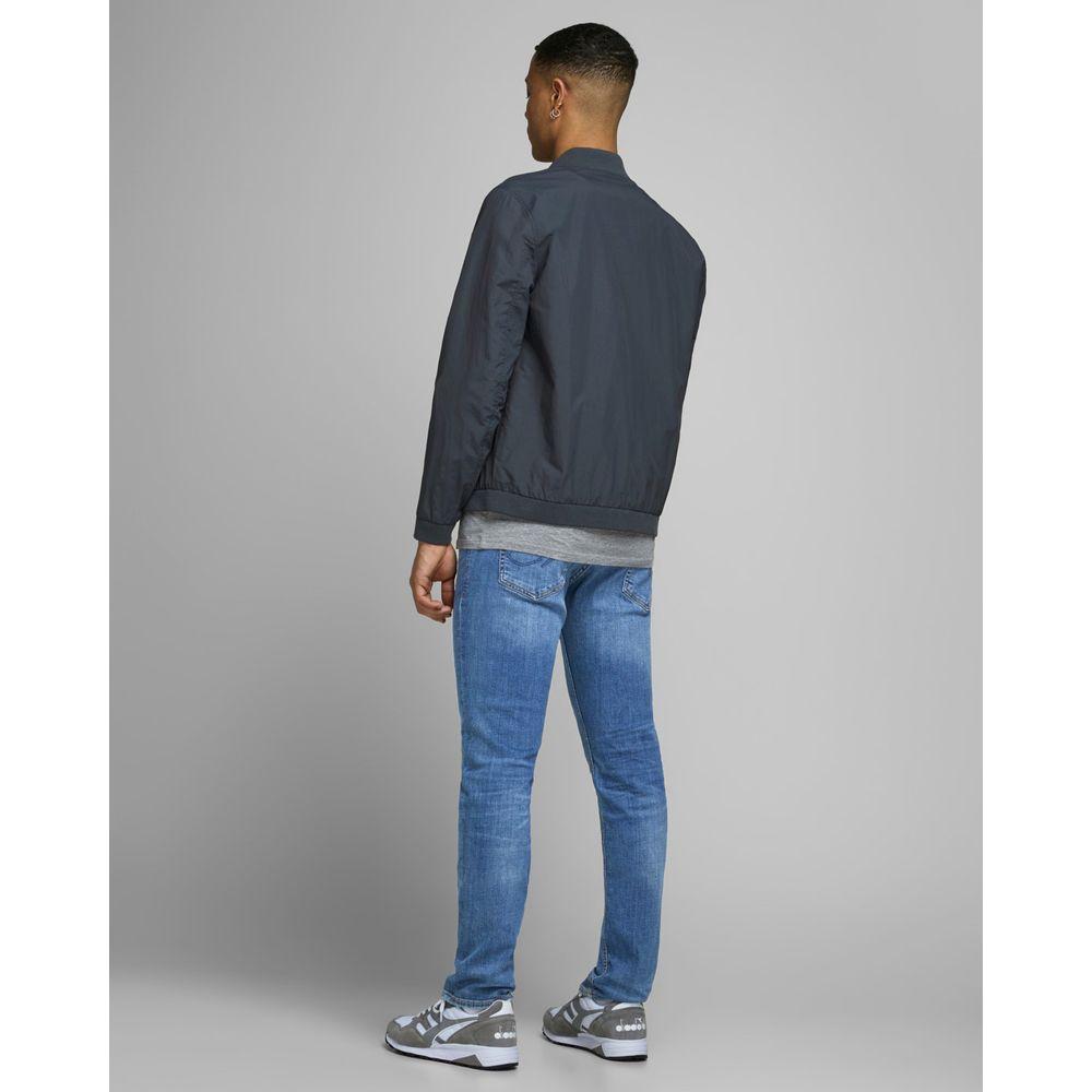 Back view of man wearing Jack Jones blue cotton slim fit jeans, perfect for casual and elegant styles.