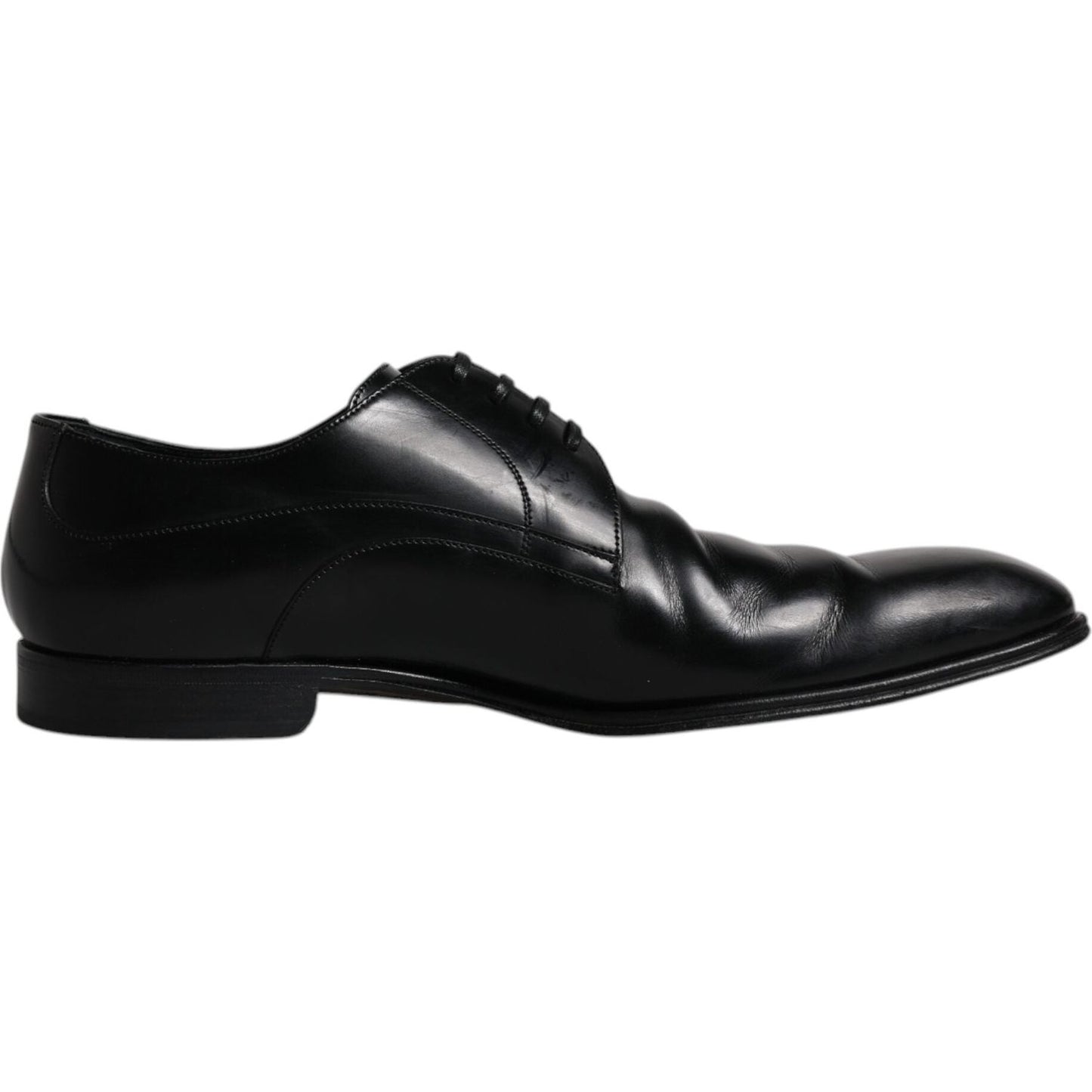 Dolce & Gabbana black leather derby men's dress shoe with lace-up closure, crafted in Italy, showcasing high craftsmanship and luxury design.
