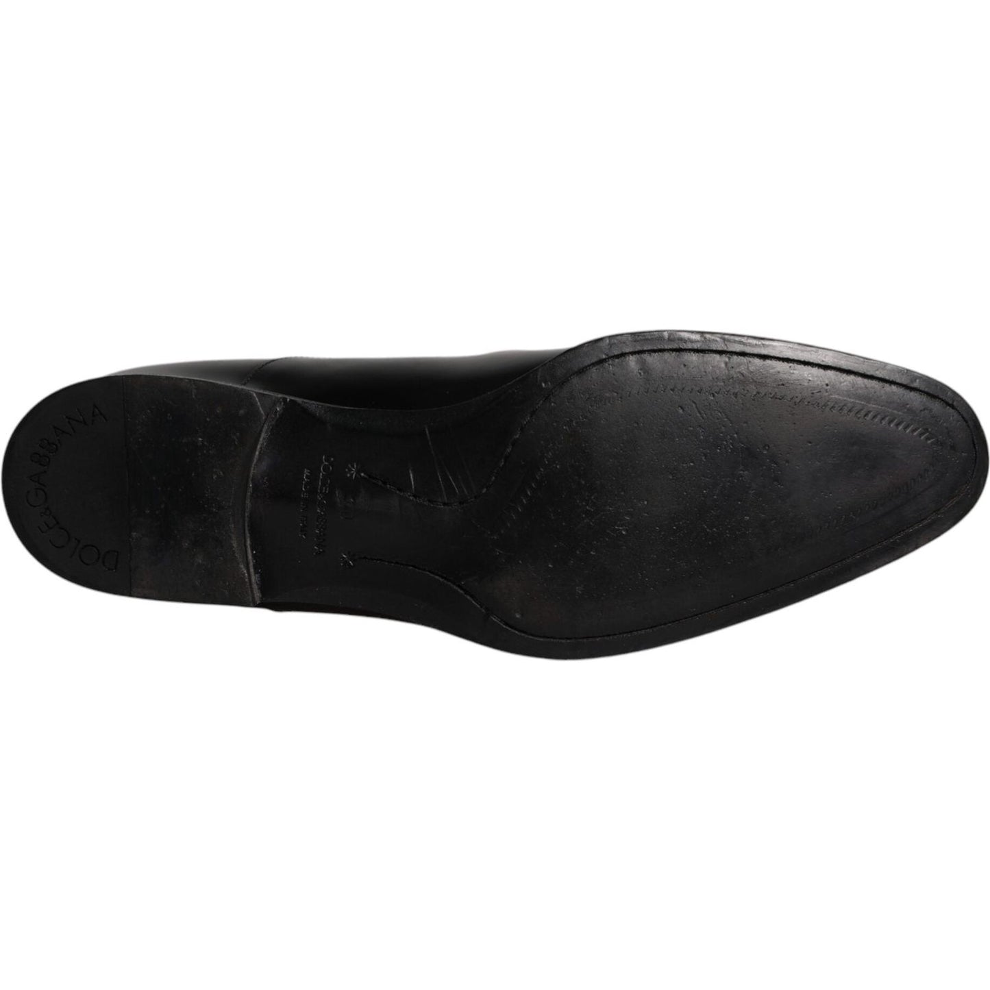 Sole view of Dolce & Gabbana black leather derby shoes for men, showcasing craftsmanship and design details.