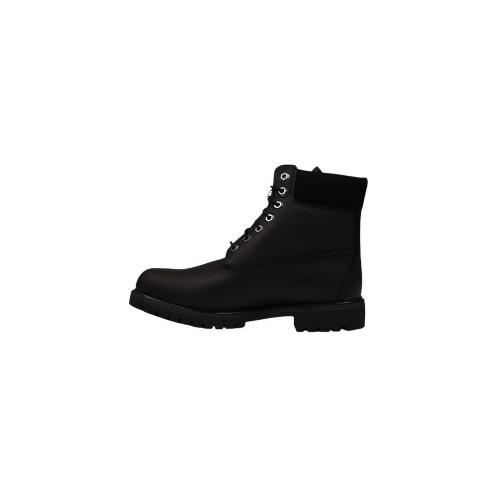 Alt Tag: Timberland black suede restorer brush boot for men, fall/winter collection, crafted with 100% suede, side view on white background.