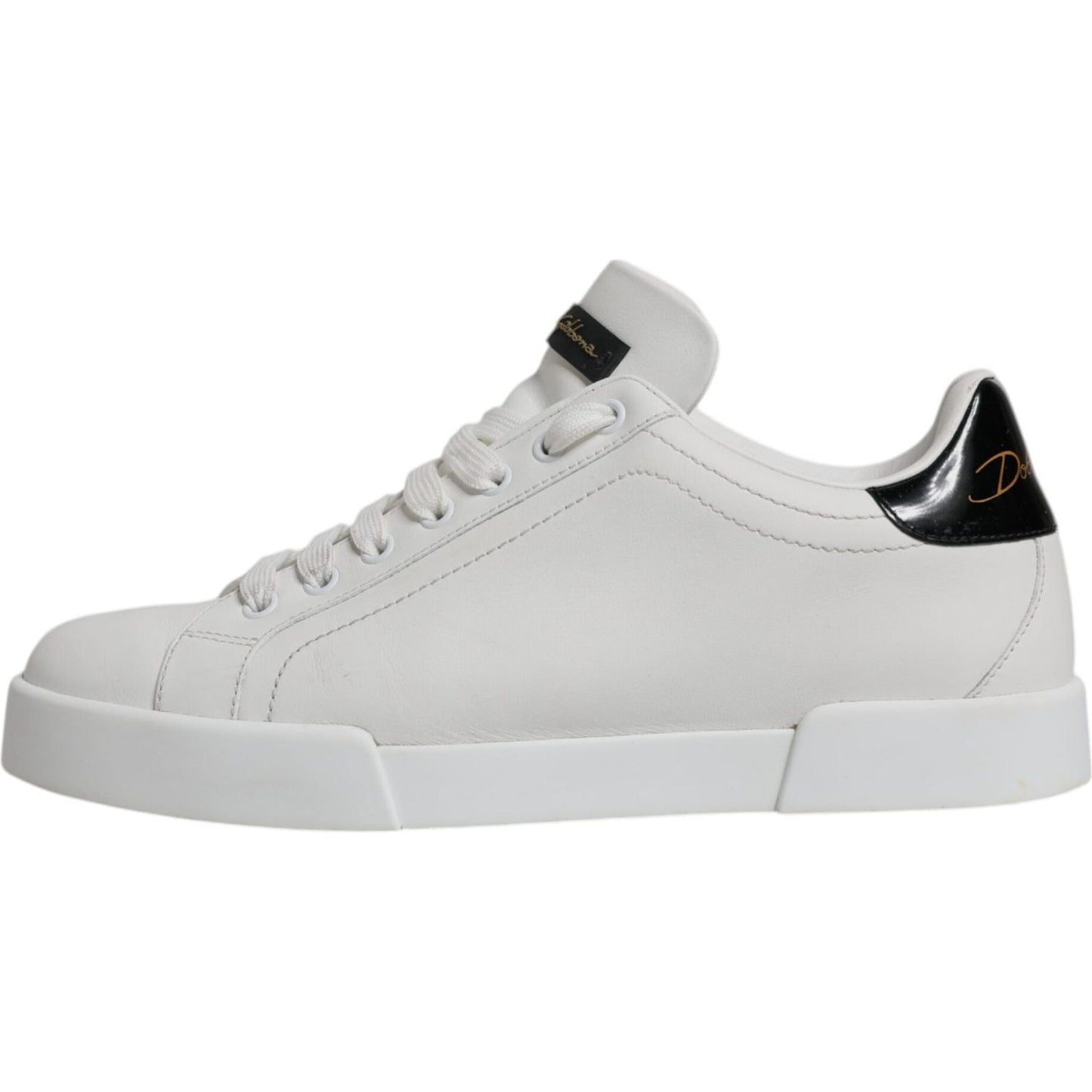 Dolce & Gabbana white leather low-top sneakers with black heel logo, lace-up closure, rubber sole, authentic Italian design.