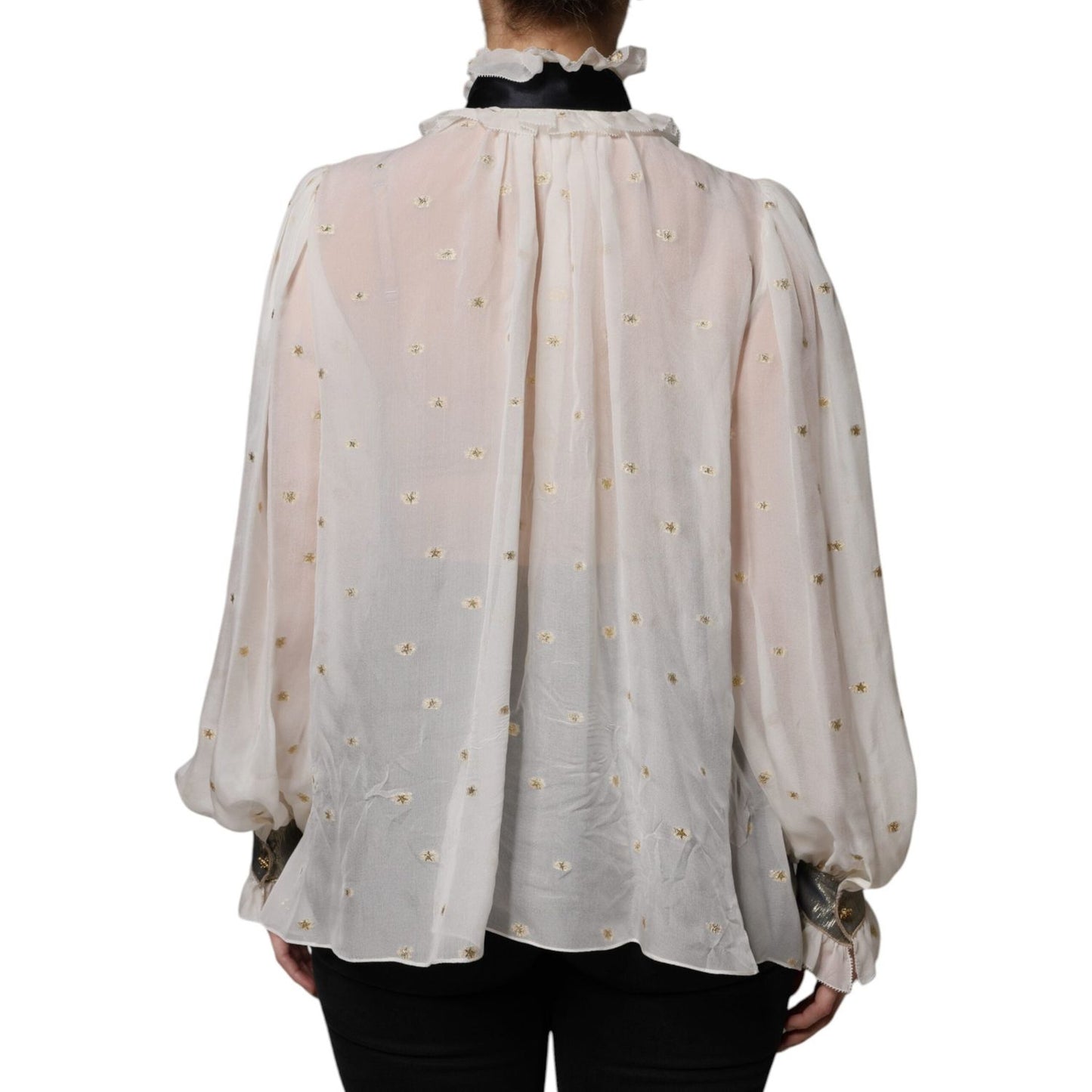 Back view of Dolce & Gabbana off white silk ascot collar blouse with ruffled design and gold details, showing minor defects.