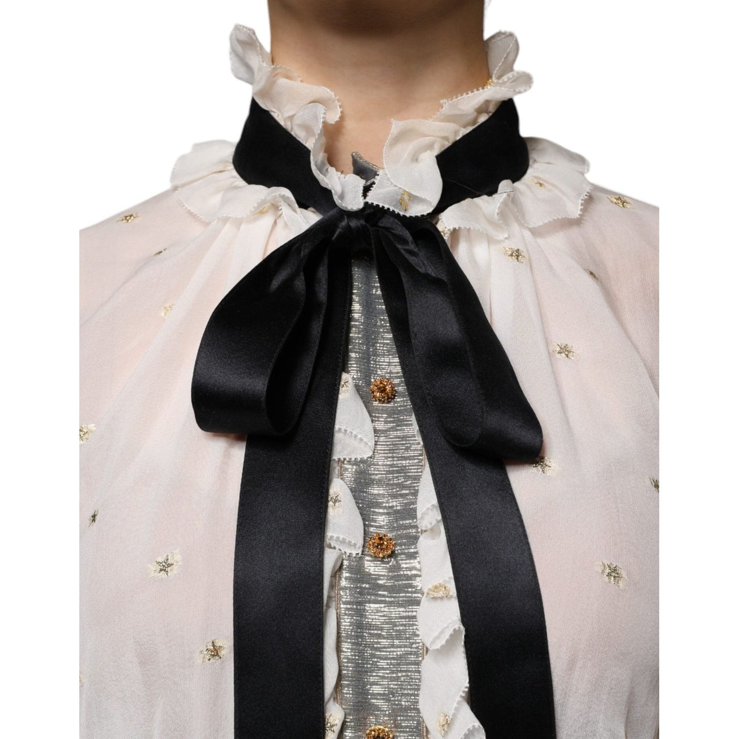 Dolce & Gabbana off white silk blend blouse with ascot collar and black necktie scarf, featuring gold accents and ruffled details.