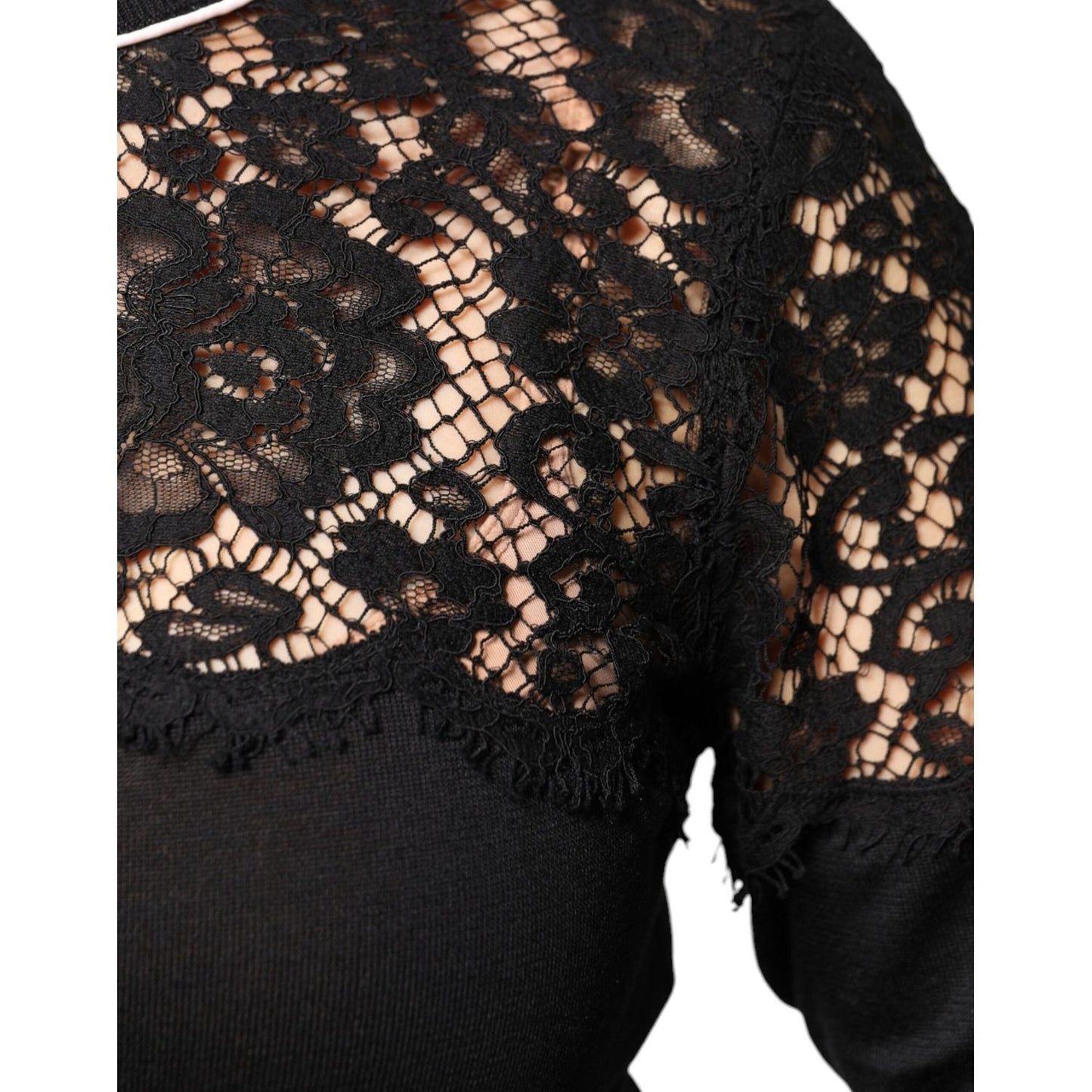 Dolce & Gabbana black silk lace blouse detail showcasing floral pattern and luxurious craftsmanship.