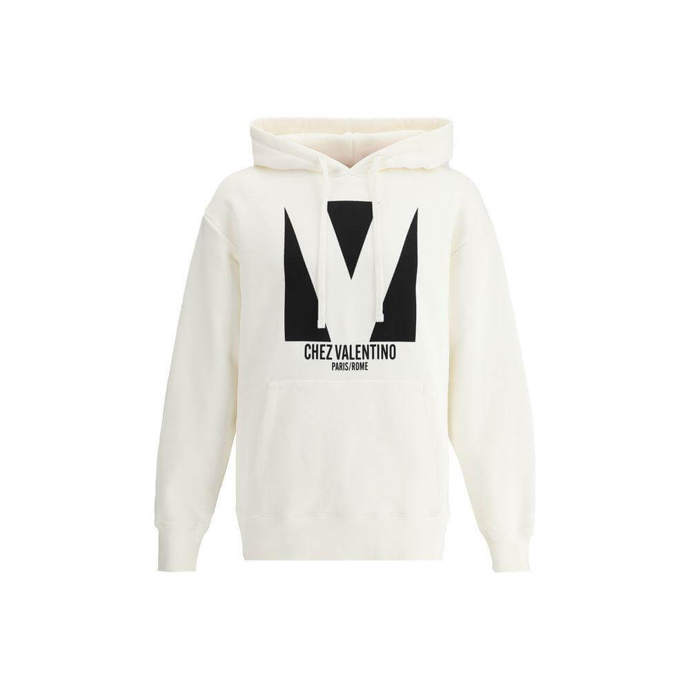 Valentino cotton hoodie with iconic black monogram print, adjustable drawstring hood, ribbed cuffs, hem, and front kangaroo pocket.