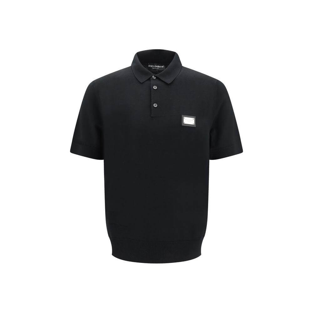 Dolce & Gabbana black polo shirt with logo monogram, featuring classic collar and button front, made of virgin wool for elegant style.