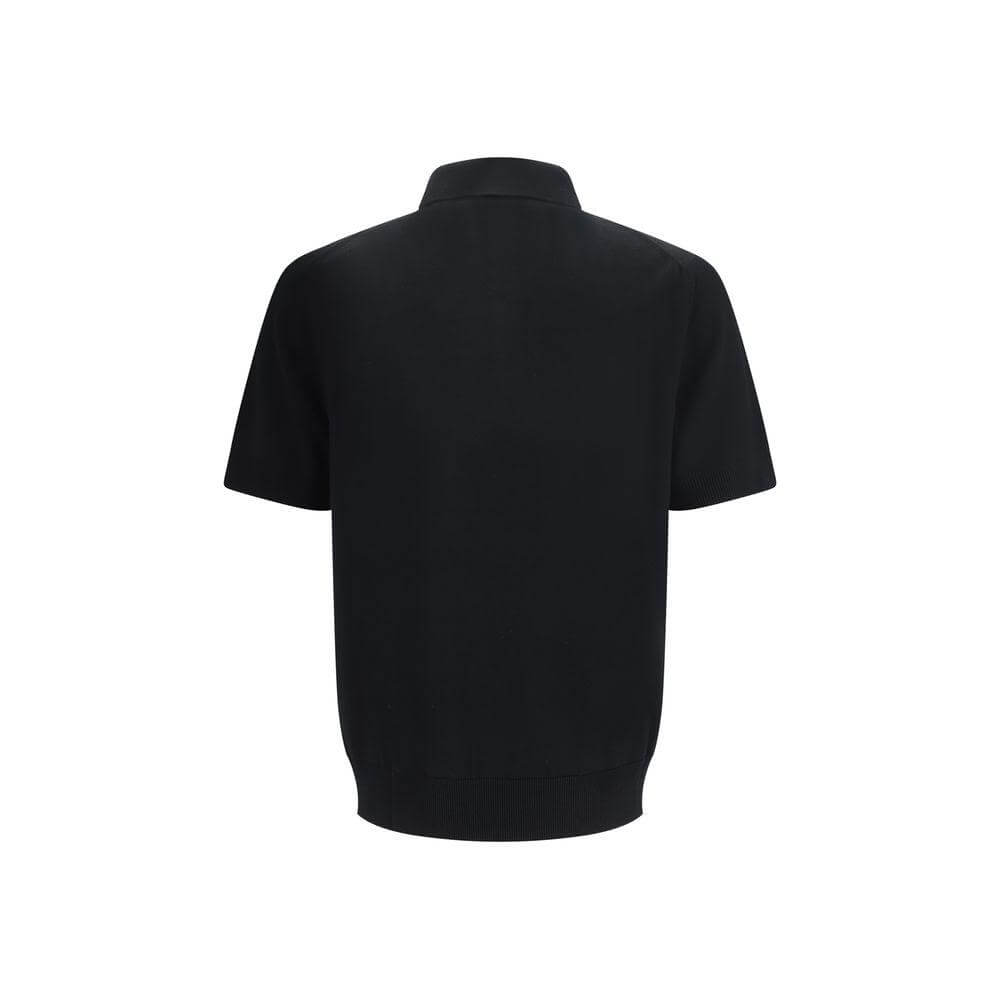 Back view of Dolce & Gabbana black logoed polo shirt with short sleeves and classic collar.