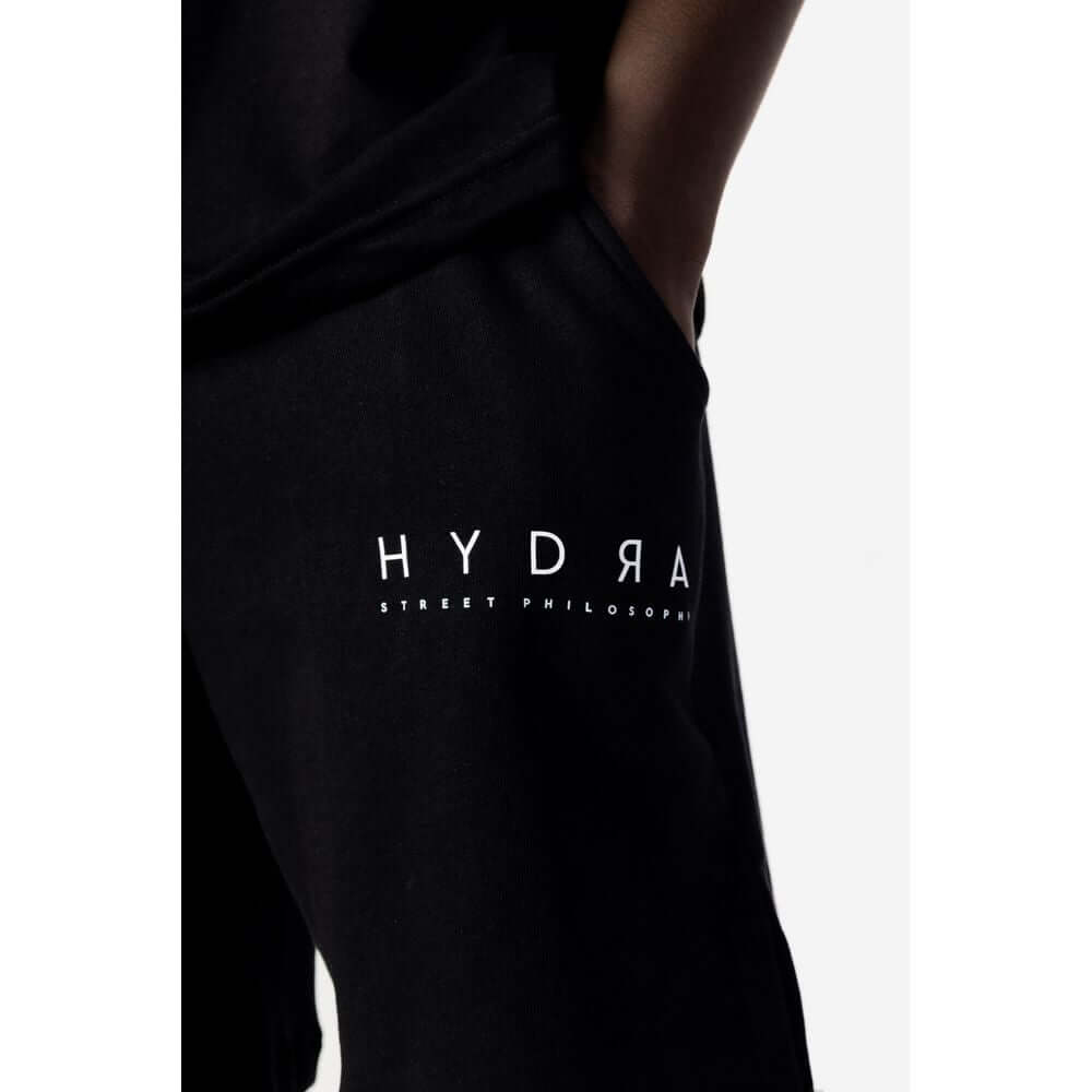Close-up of Hydra Clothing black cotton men's short suit, perfect for spring and summer fashion.