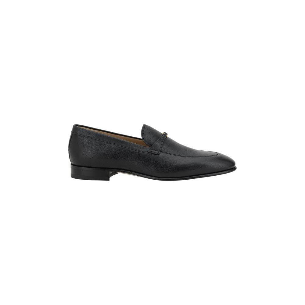Valentino Garavani black leather loafers with iconic VLogo, round toe, contrasting insole, slip-on design for comfort and luxury.