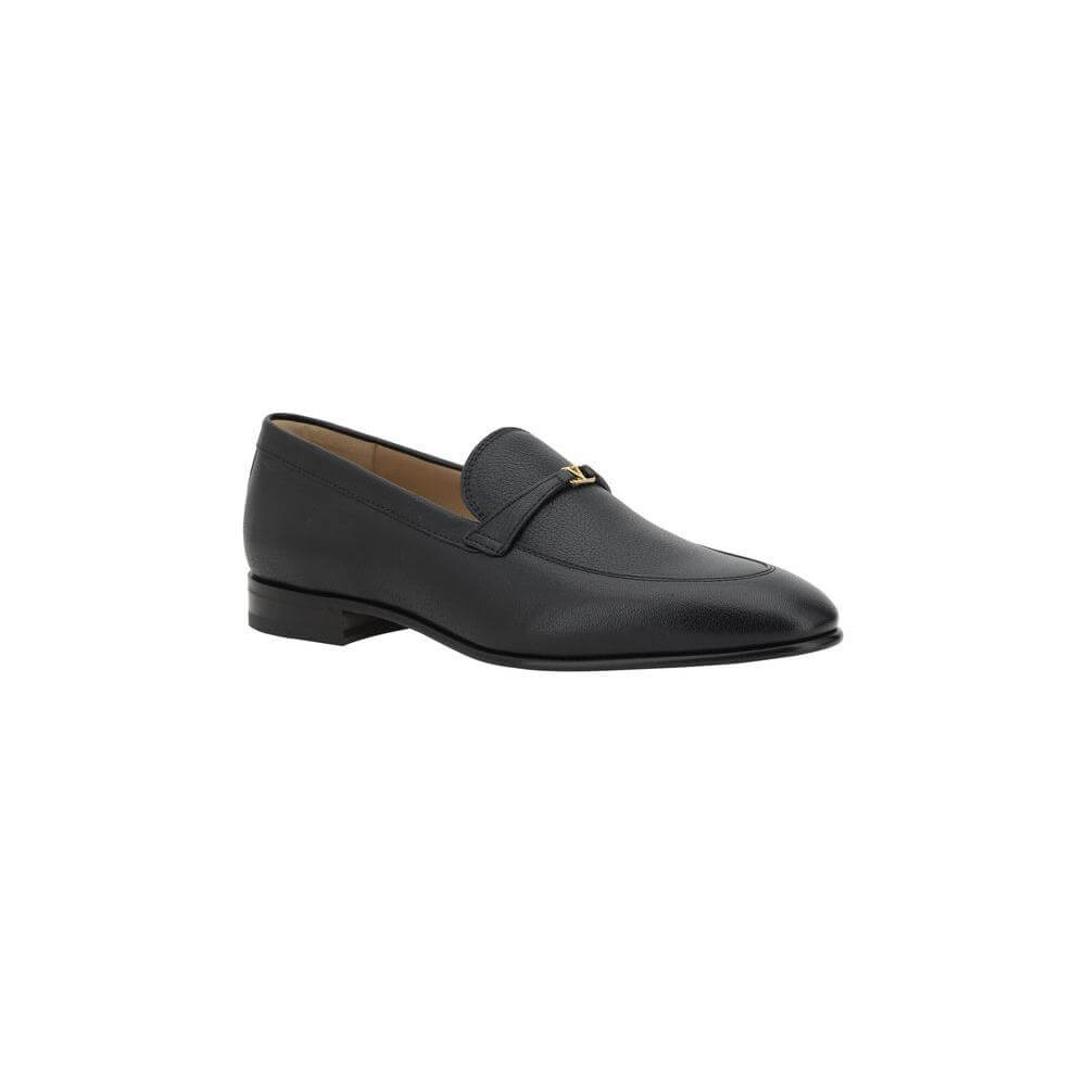 Valentino Garavani leather loafers with VLogo plaque, round toe, slip-on design, and contrasting logo insole.