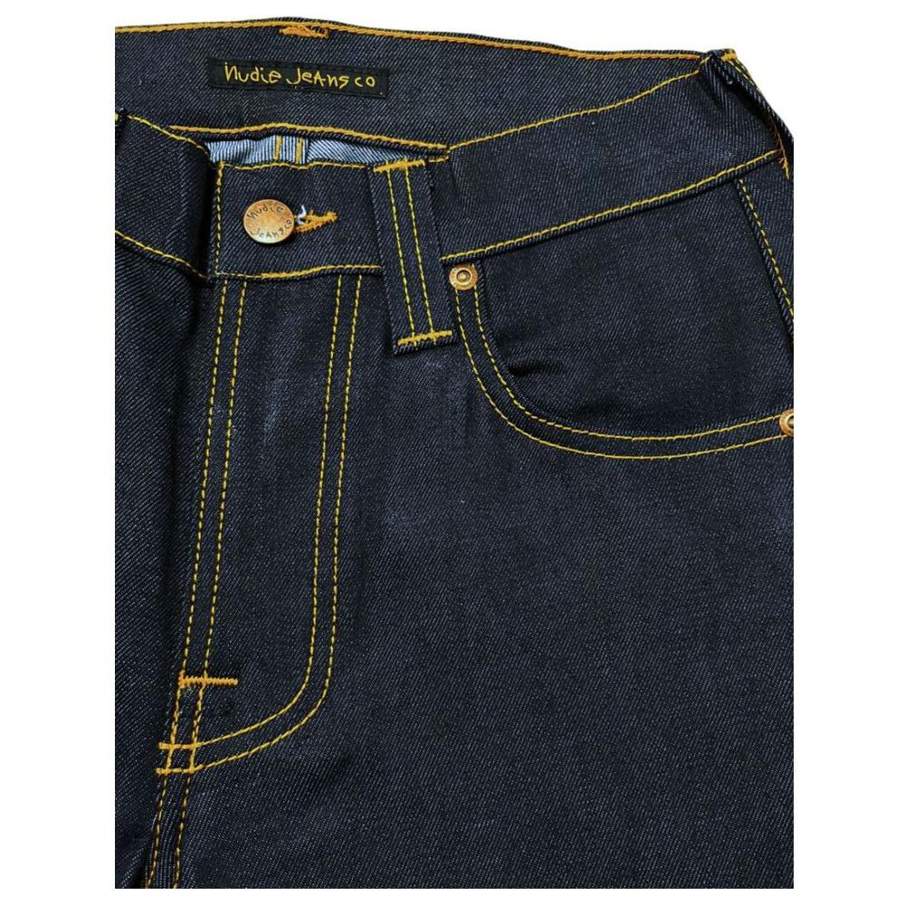 Nudie Jeans women's blue cotton jeans with button closure and chic pocket detail, featuring iconic rear logo patch for stylish comfort.