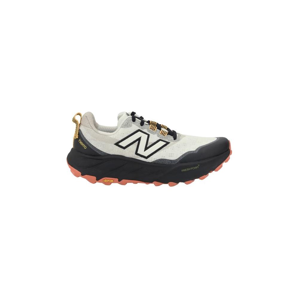 New Balance Fresh Foam X Hierro v9 sneaker with Vibram Megagrip outsole, reinforced toe, and lace-up closure, side view.