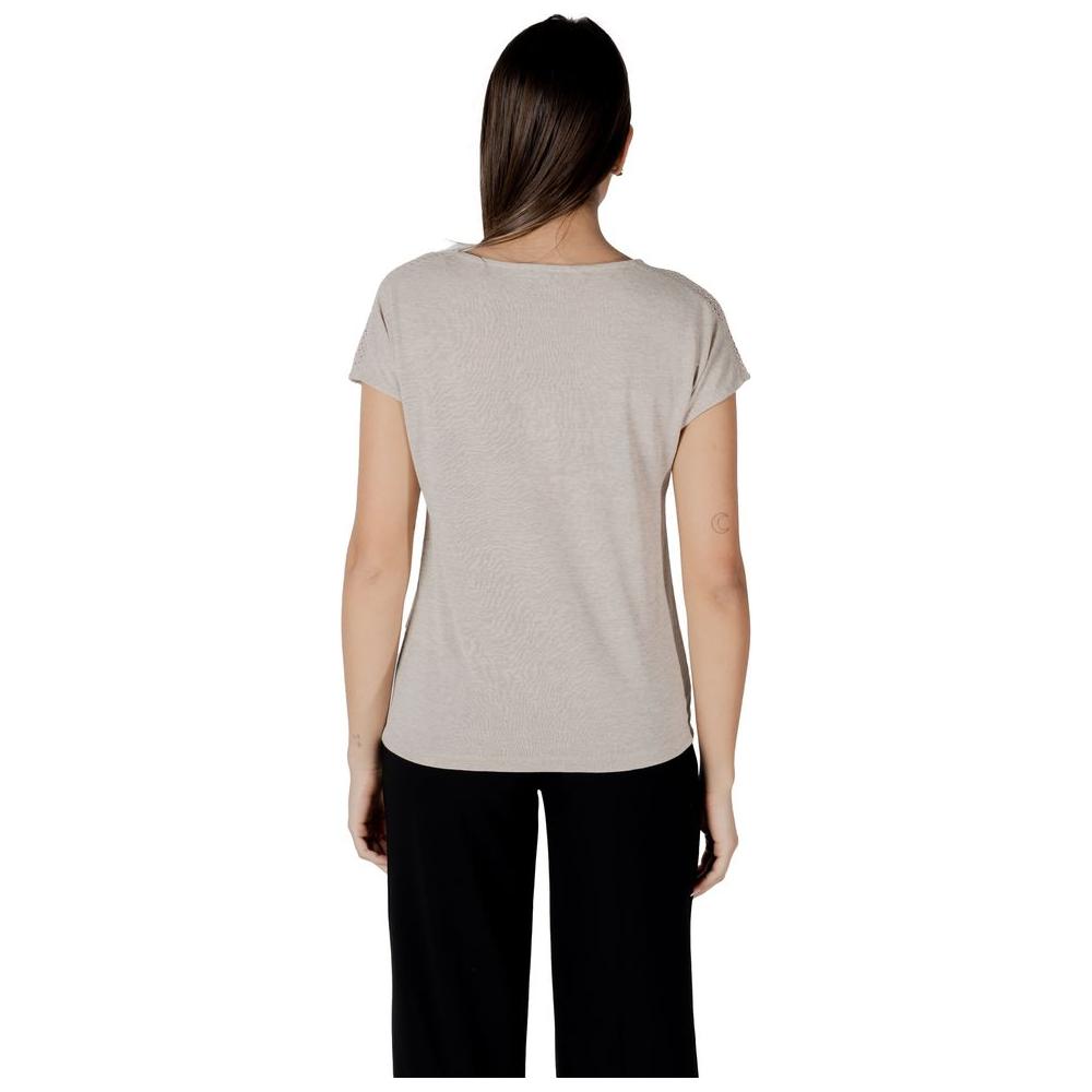 Back view of woman wearing Street One beige polyester top with short sleeves and lace shoulder detail.