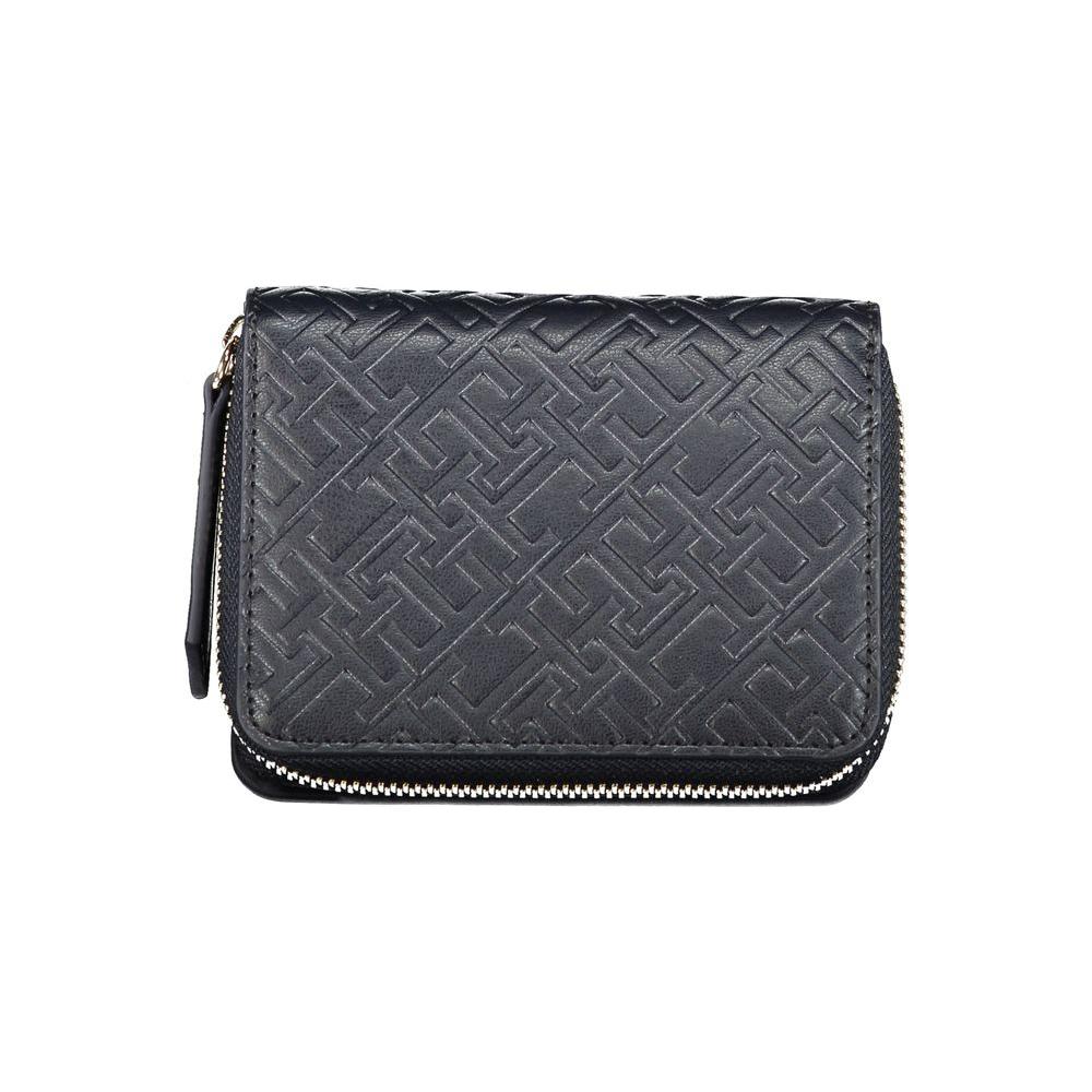 Tommy Hilfiger blue polyethylene wallet with embossed pattern, contrasting details, zip, automatic closure, and logo design.