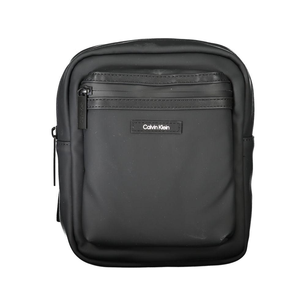 Calvin Klein black polyester men's shoulder bag with adjustable strap and exterior pocket, featuring the iconic logo.