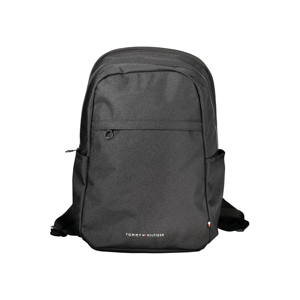 Tommy Hilfiger black backpack with logo, adjustable straps, multiple pockets, and laptop compartment; made from 95% recycled polyester.