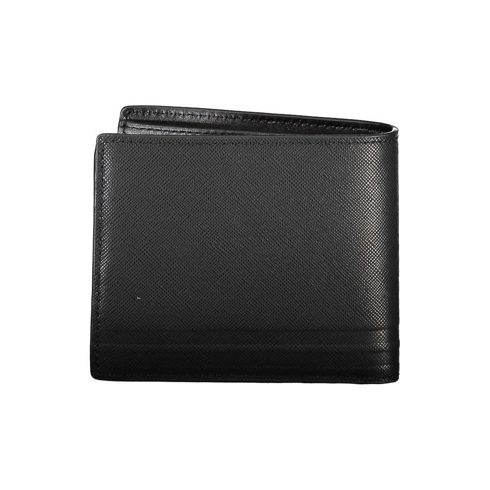 Tommy Hilfiger black leather men's wallet with spacious compartments, coin purse, and card slots, featuring bold logo design.