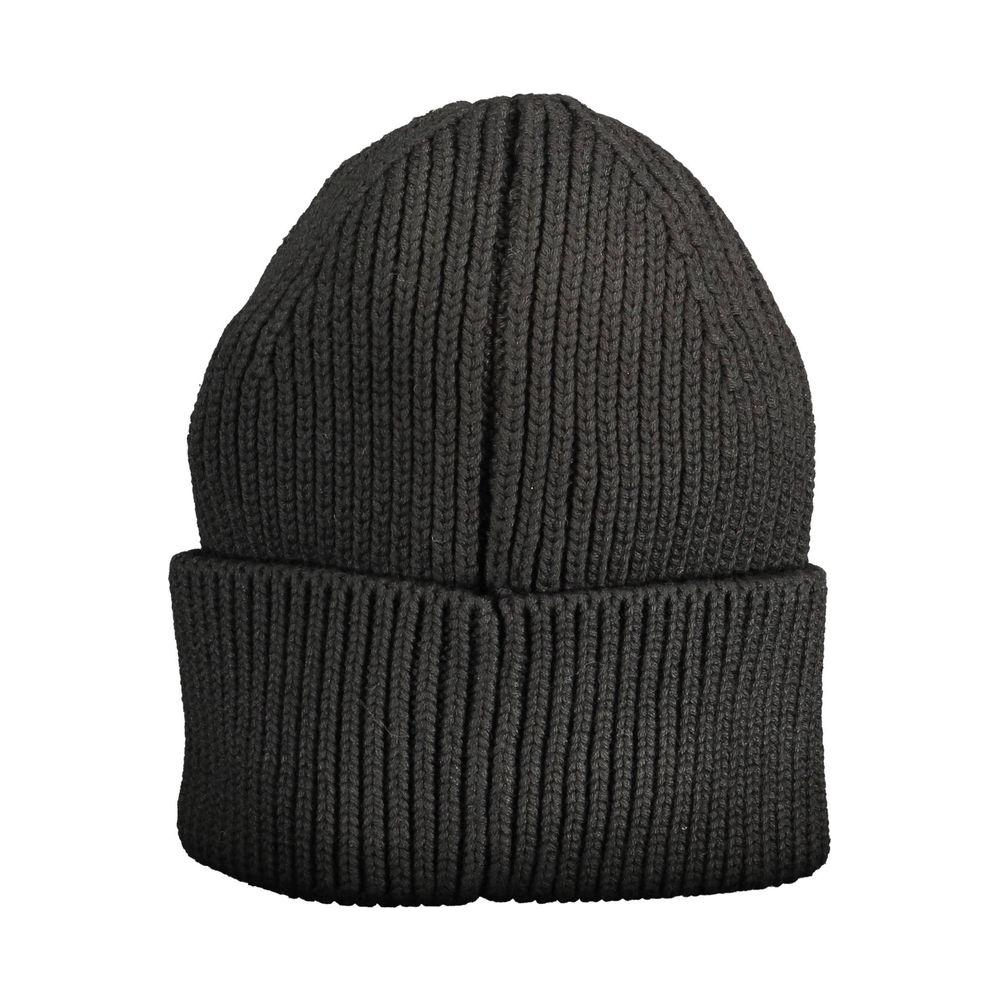 Black knit beanie hat with ribbed texture, folded cuff, and simple design, ideal for winter fashion and cozy comfort.