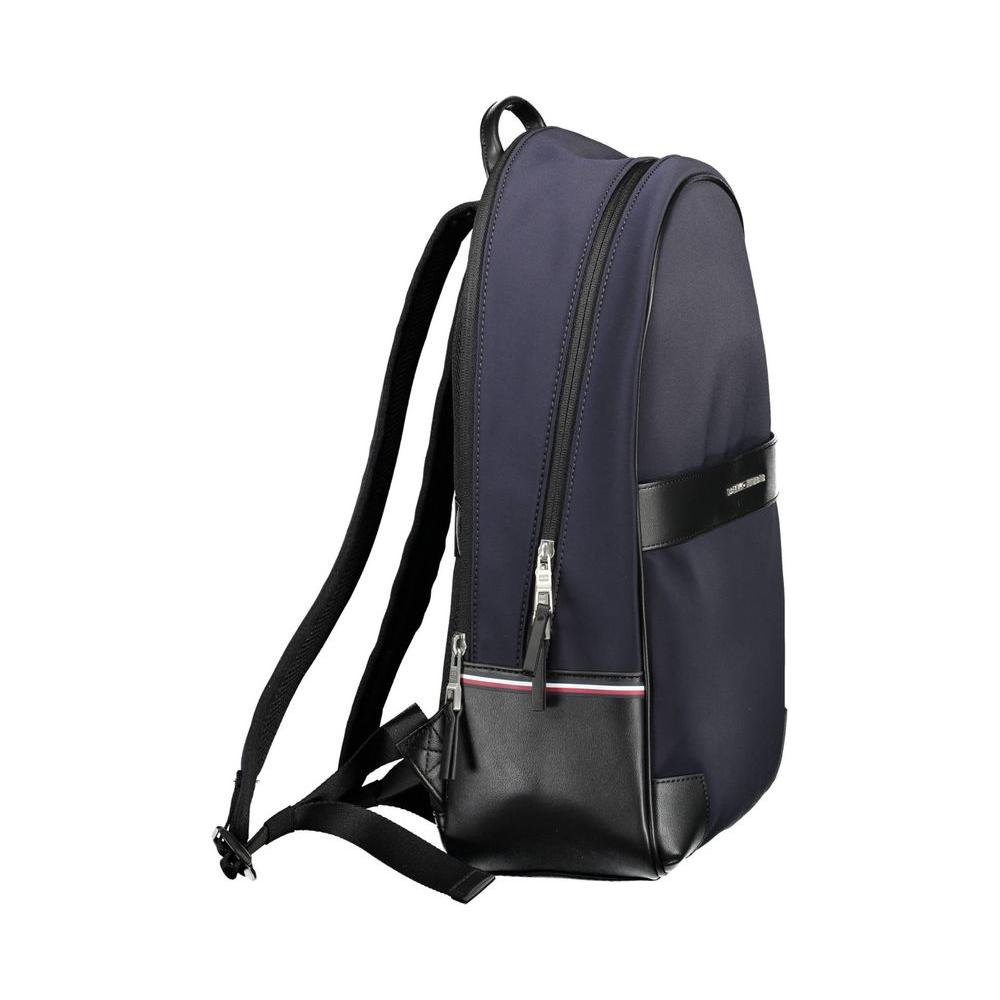 Tommy Hilfiger blue polyethylene men's backpack with adjustable straps and laptop compartment, showcasing style and functionality.