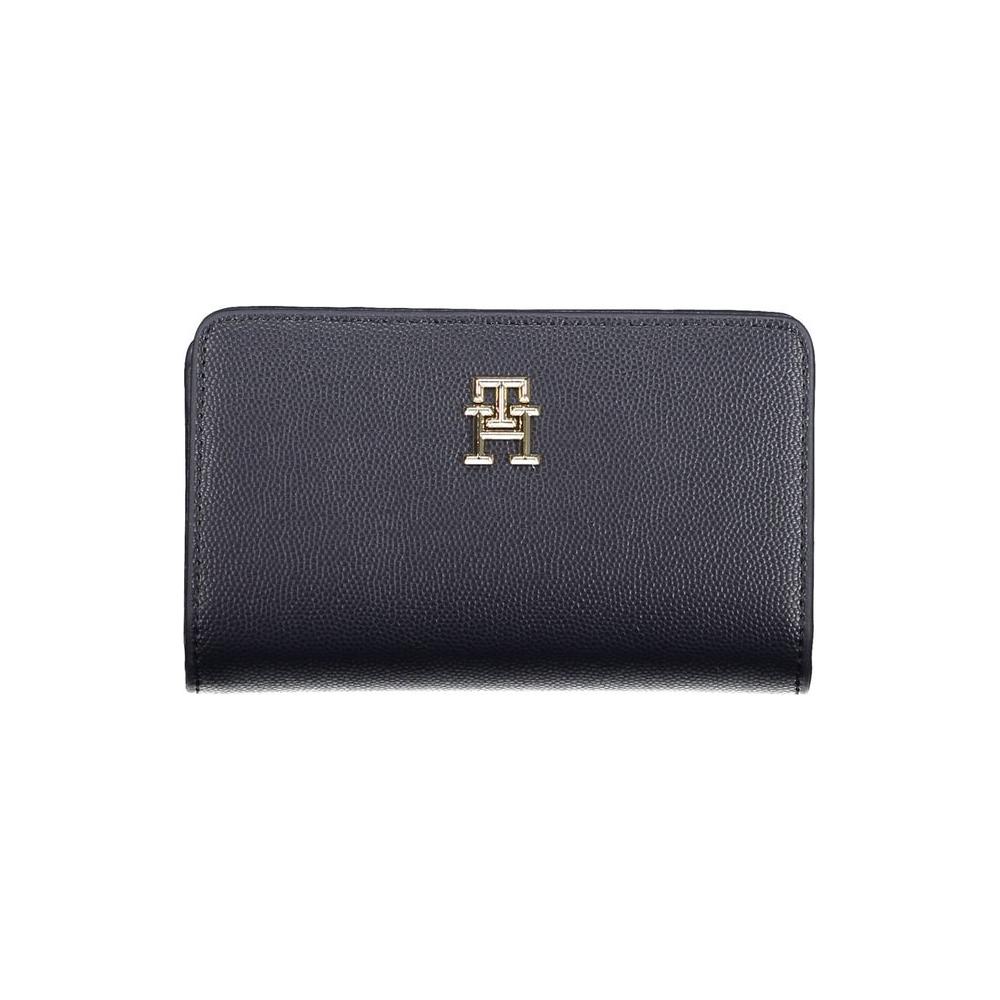 Tommy Hilfiger black women’s wallet with logo, featuring multiple compartments and durable design.
