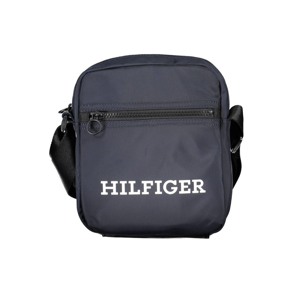 Tommy Hilfiger blue polyester men's shoulder bag with logo, featuring adjustable strap and practical pockets.