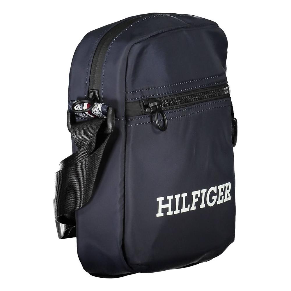 Tommy Hilfiger blue polyester men's shoulder bag with adjustable strap and logo, eco-friendly design for modern fashion style.