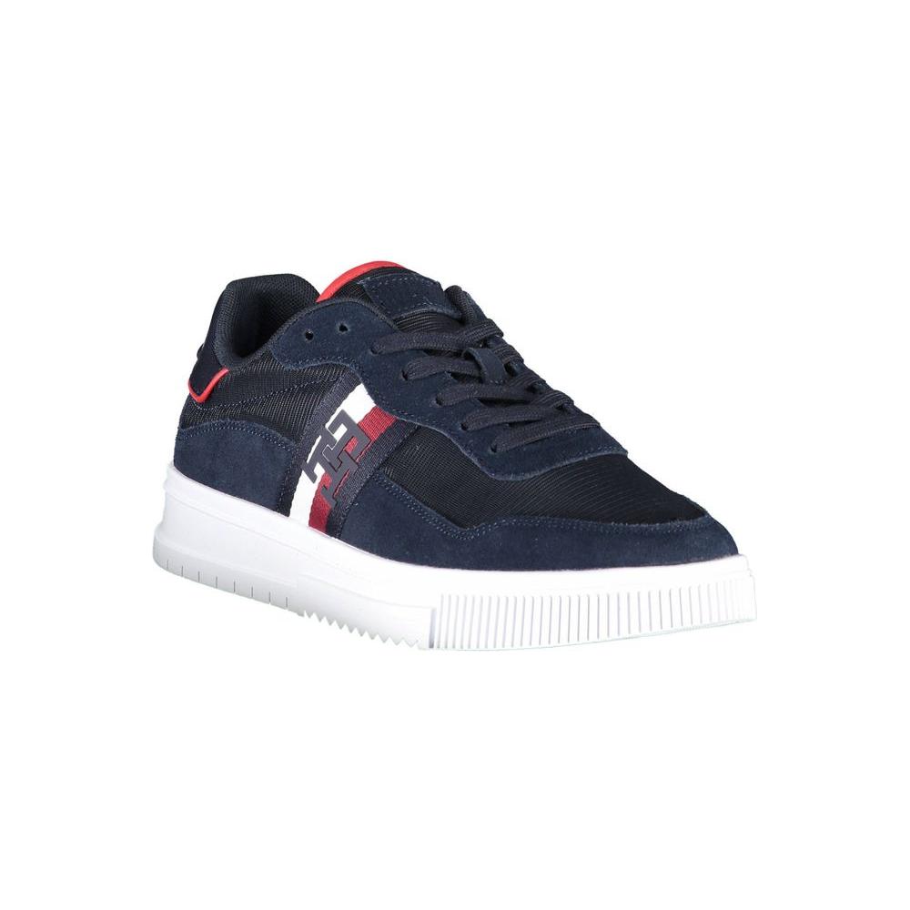 Alt Tag: Tommy Hilfiger blue polyester men sneaker with recycled materials, contrast details, and signature logo, eco-friendly design.