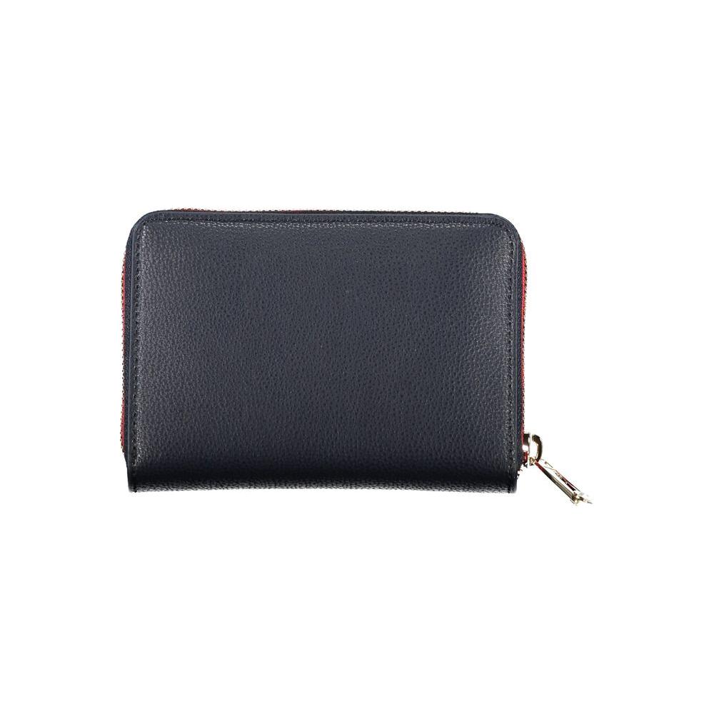 Tommy Hilfiger sleek blue wallet with zip closure, featuring ample compartments and eco-friendly recycled polyester design.
