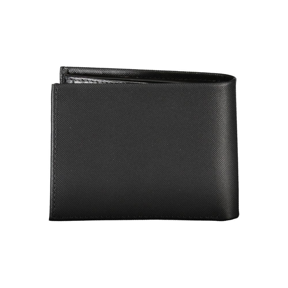 Calvin Klein black leather wallet with RFID blocking and dual card spaces, featuring a sleek design and secure compartments.