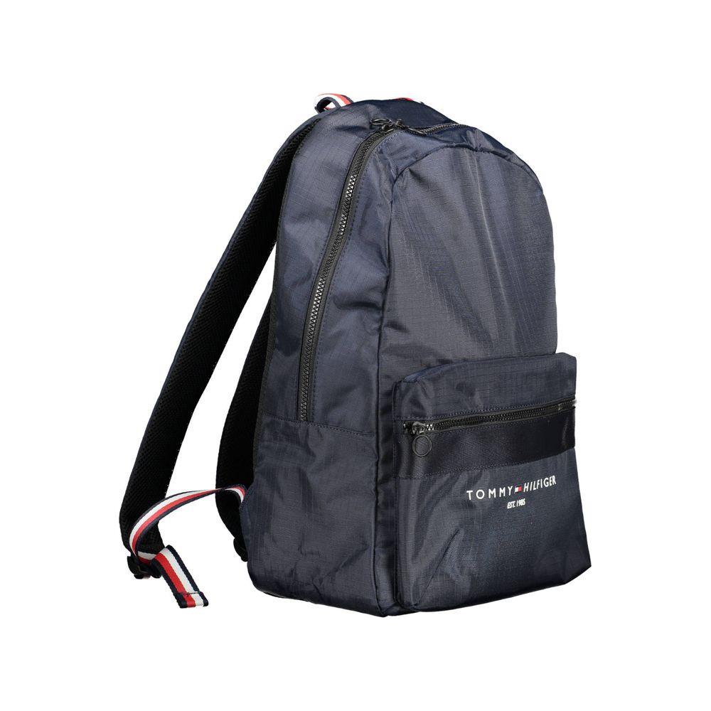 Tommy Hilfiger blue polyester backpack with external pocket and adjustable straps, eco-friendly design for modern urban style.