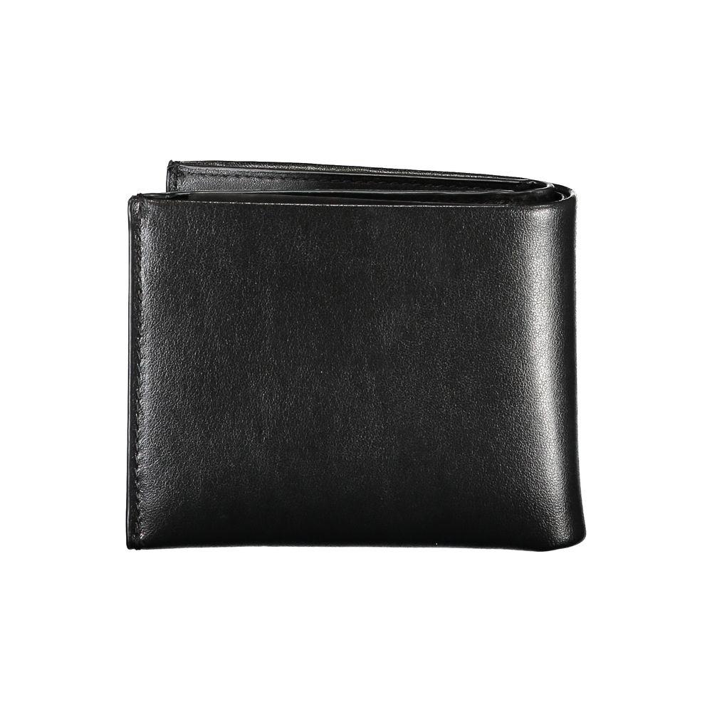 Calvin Klein elegant black leather dual-compartment wallet for modern men with coin purse and multiple card slots.