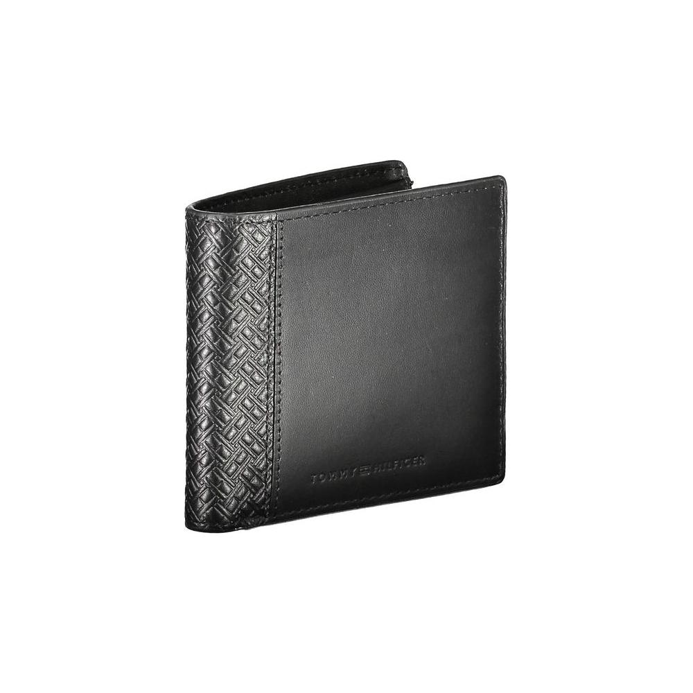 Tommy Hilfiger black leather men's wallet with embossed pattern and logo, featuring two compartments and multiple card slots.