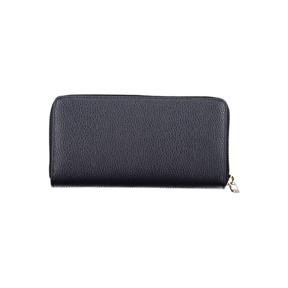 Tommy Hilfiger blue polyethylene women's wallet with zip closure and iconic logo, featuring 5 compartments for chic utility and style.